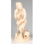 A Japanese Meiji period carved ivory okimono as a standing man,