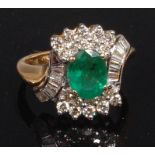 A contemporary 18ct gold, emerald and diamond dress ring,