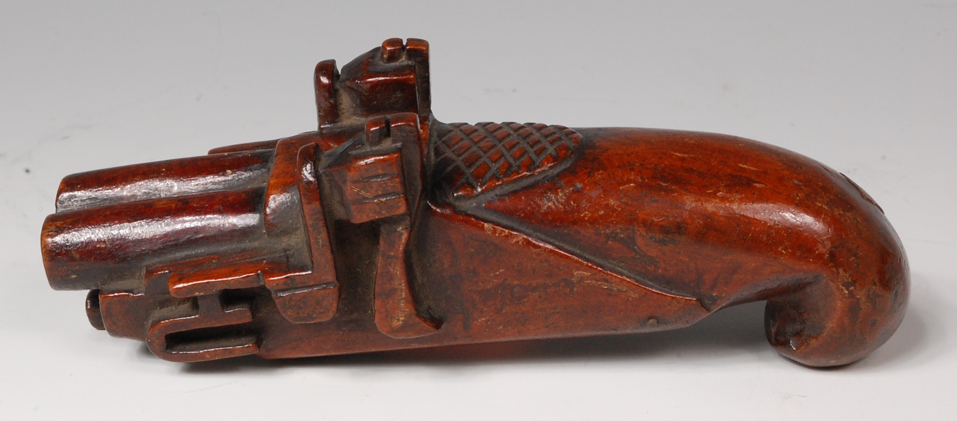 A 19th century treen snuff-box, carved as a double barreled flintlock pistol, hinged to underside, - Image 3 of 5