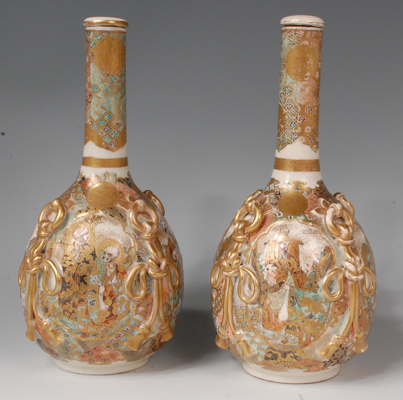 A pair of Japanese Meiji period satsuma bottle vases and covers, - Image 2 of 2