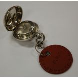 An Edwardian silver sovereign cased by Aaron Lufkin Dennison, Birmingham 1909,