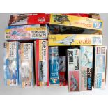 13 assorted 1/72nd scale plastic aircraft and military kits, all appear un-made,