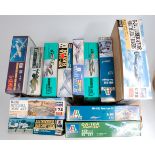 12 assorted 1/72nd scale plastic aircraft and military kits,