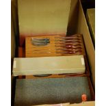 A box of miscellaneous cased cutlery