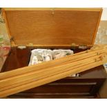 A modern artists wooden box and contents together with a folding easel