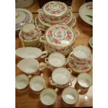A Royal Worcester part tea and dinner service of Palladian shape in the Royal Garden pattern to