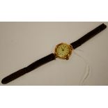 An early 20th century ladies 18ct gold cased wristwatch with manual wind movement