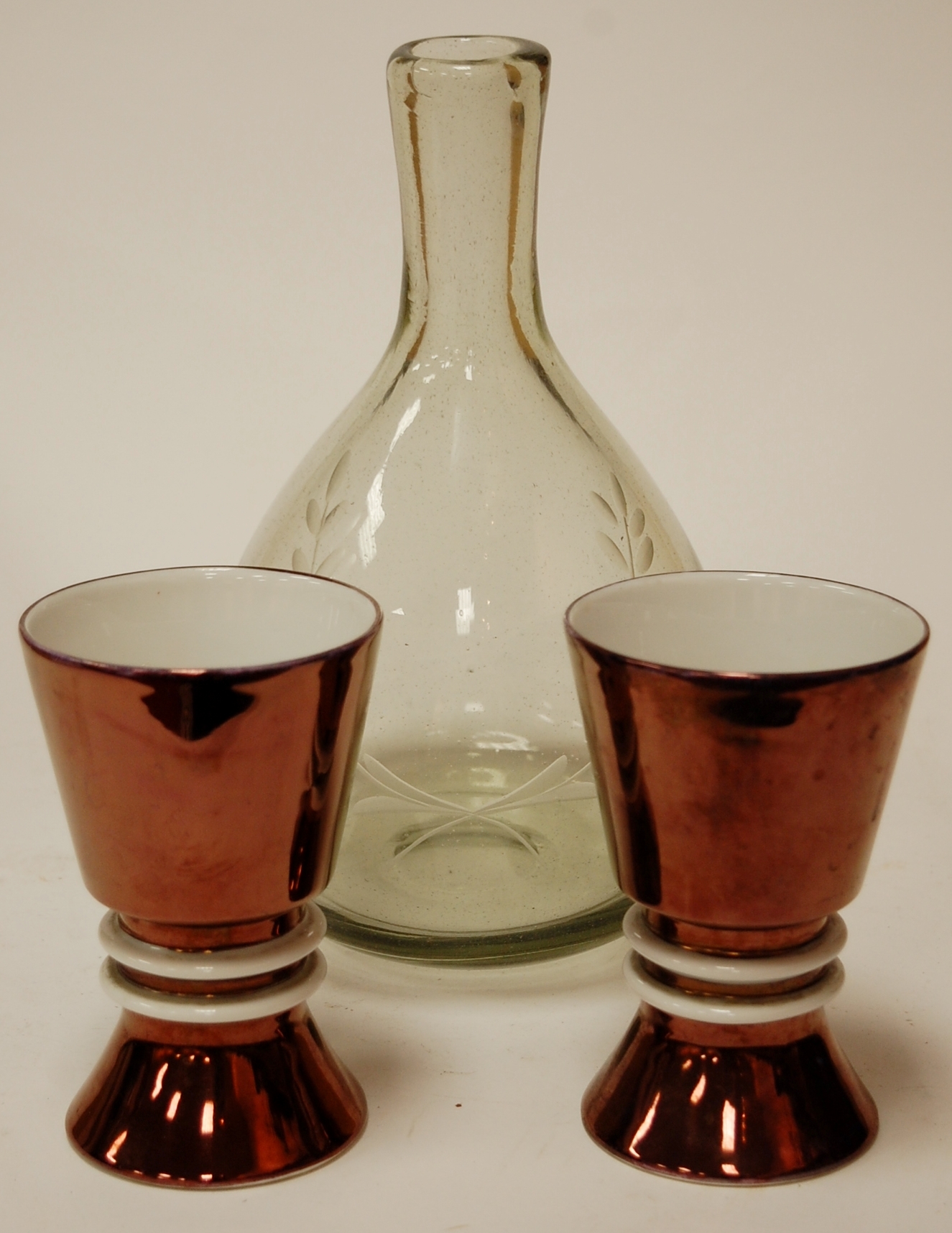 An etched glass bottle vase together with a pair of Royal Worcester porcelain goblets (3)