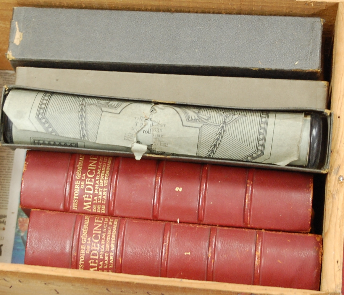 Two leather bound volumes of the History of General Medicine,