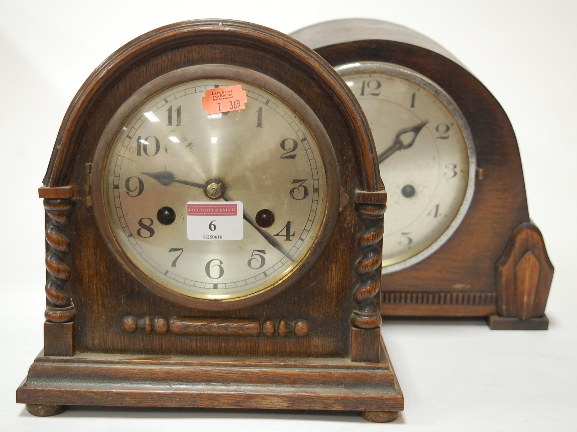 A 1920s oak cased mantel clock having a silvered dial and Arabic numerals together with a 1930s oak