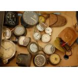A small collection of assorted speedometers and other instruments