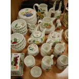 A large collection of assorted Portmeirion wares in the Pomona pattern to include teapots,