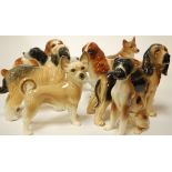 A Coopercraft figure of a spaniel together with various other dog figures