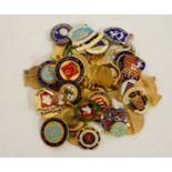 A small collection of assorted gilt metal and enamelled badges mainly being of bowling interest