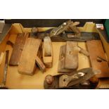 A box of assorted hand tools to include various moulding planes etc