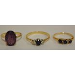 A ladies 9ct gold amethyst set dress ring,