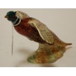 A Beswick model of a pheasant numbered verso 850