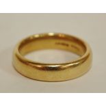 A gentleman's 9ct gold wedding band, gross weight 9.