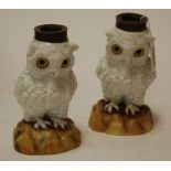 A pair of early 20th century Continental porcelain figural decanters each in the form of an owl