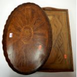 A George III mahogany and rosewood cross banded oval tray together with a carved softwood twin