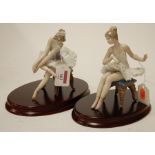 A pair of Lladro figures,