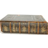 A large Victorian leather bound family bible with illustrations by Gustav Door