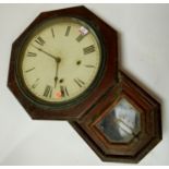 A late 19th century faux rosewood cased drop trunk wall clock having painted dial with Roman