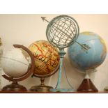 A modern table top terrestrial globe together with a an armillary style globe and two others (4)