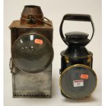 A pair of mid 20th century British Rail black lacquered signal lamps together with one other (3)