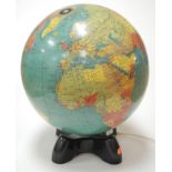 A mid 20th century Geograma Ltd illuminated library terrestrial globe