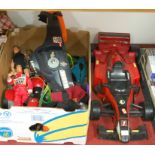 A small collection of various Action Man figures together with a model formula 1 car