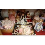 A large collection of assorted modern collector's dolls