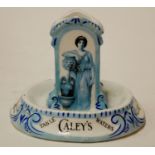 An early 20th century Continental table vesta/ashtray advertising Caley's Table Waters with Royal