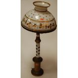 An early 20th century brass and glass overlaid pedestal table lamp,