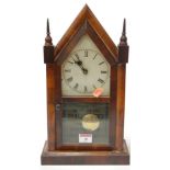 A late 19th century American mahogany cased steeple clock having a painted dial with Roman numerals