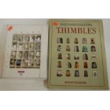 A collection of twenty various thimbles to include silver examples together with the Letts Guide to