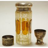 An early 20th century continental amber glass and silver mounted sugar sifter,