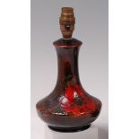 A Moorcroft pottery flambe table lamp, in the Orchid pattern,