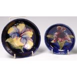 A Moorcroft small pottery shallow footed table bowl, in the Anemone pattern,