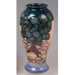 A modern Moorcroft baluster form pottery vase, in the Mamoura pattern,