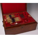 A mid-Victorian oak fitted cutlery canteen and part contents, in the Kings pattern,
