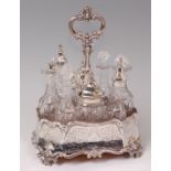 A mid-Victorian silver eight bottle cruet stand, of shaped octagonal form, with centre carry handle,