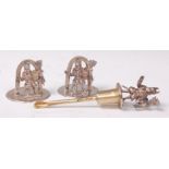 A pair of Edwardian silver menu holders, each modelled as 'The Trusty Servant' on circular base,