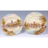 A pair of Royal Worcester porcelain cabinet plates,