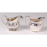 A George IV silver cream jug, of squat circular form, having gadrooned rim, gilt washed interior,
