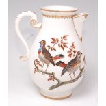 An 18th century Meissen porcelain cream jug, polychrome decorated with birds upon branches,