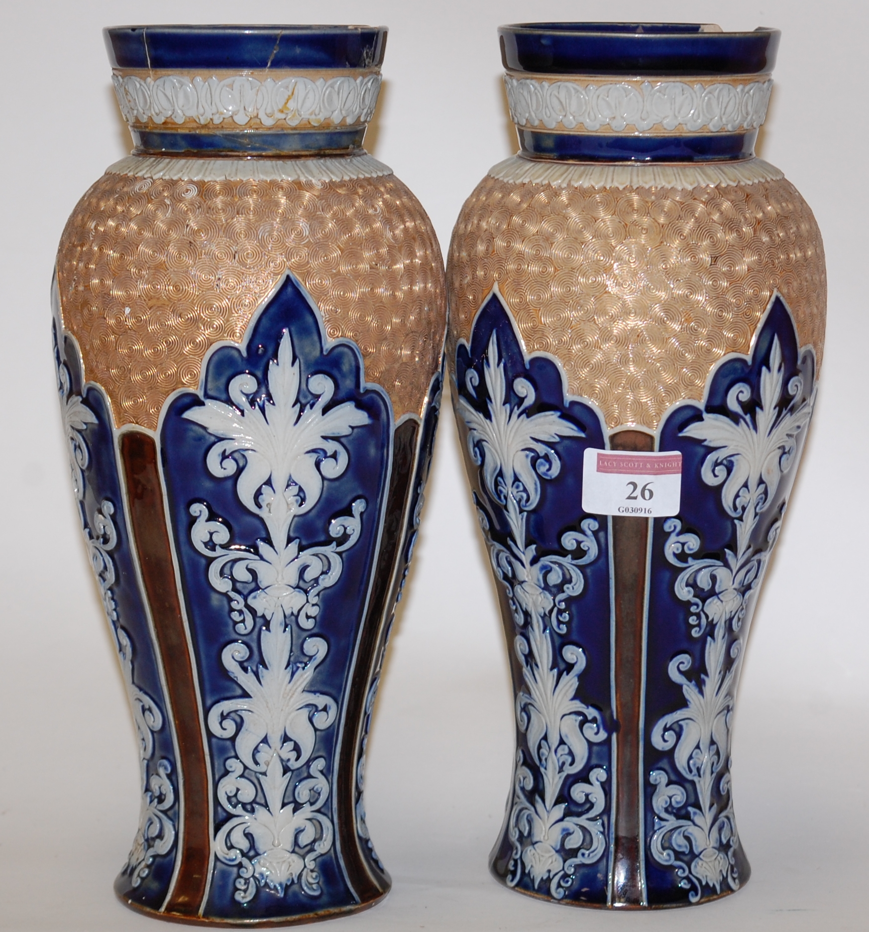 A pair of Doulton Lambeth stoneware vases, of baluster form,