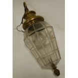 An early 20th century brass mounted glass ceiling light fitting