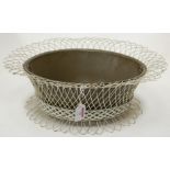 A wirework planter of oval form with liner