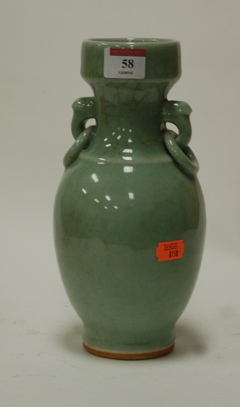 A modern Chinese Celadon glazed twin handled vase